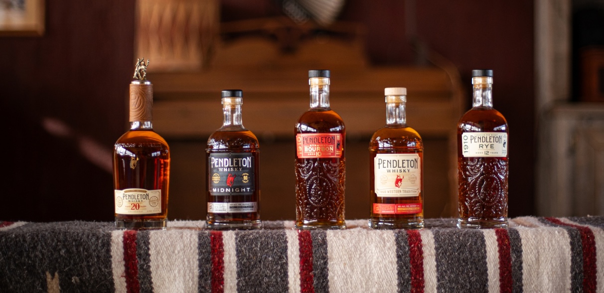 Pendleton Whisky bottles, including Pendleton 20 Year, Midnight, Bourbon, Original, and 1910 Rye.